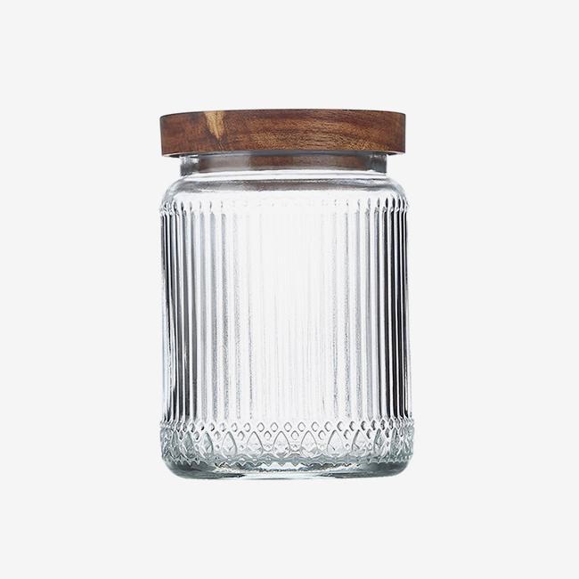 Ribbed glass jar with wooden lid