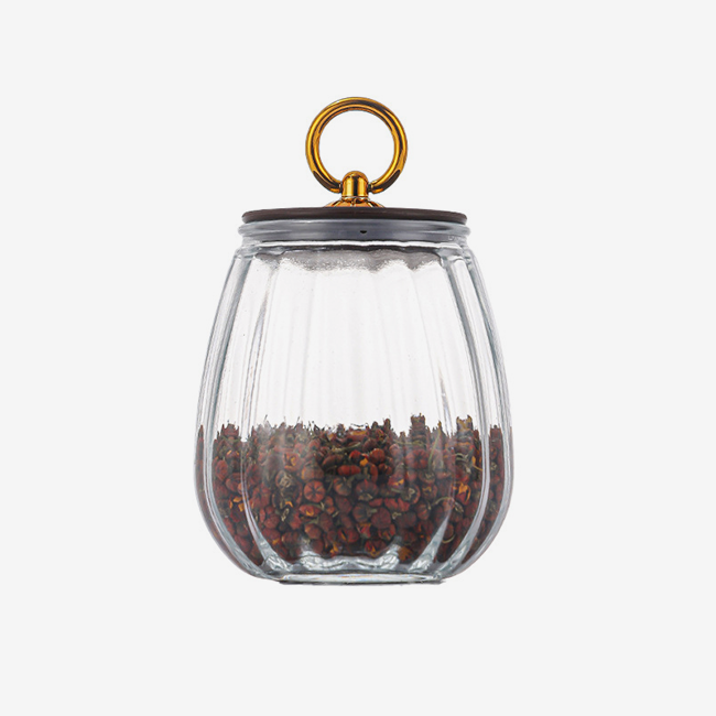 Pumpkin-shaped clear glass storage jar