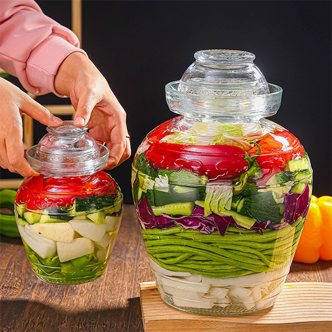 Traditional glass fermentation jar with lid